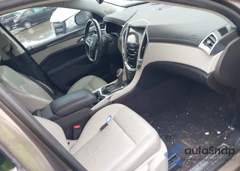 2014 Cadillac Srx Standard z USA, uszkodzony, nr VIN 3GYFNAE32ES582939